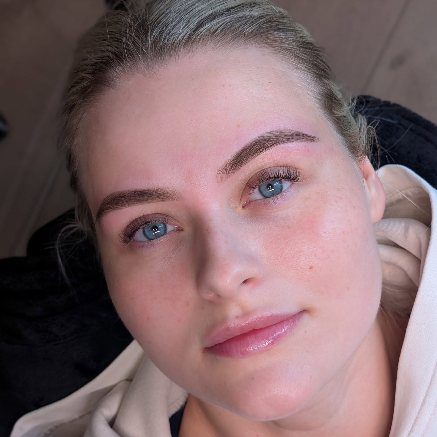 A client with soft, natural finished brows
